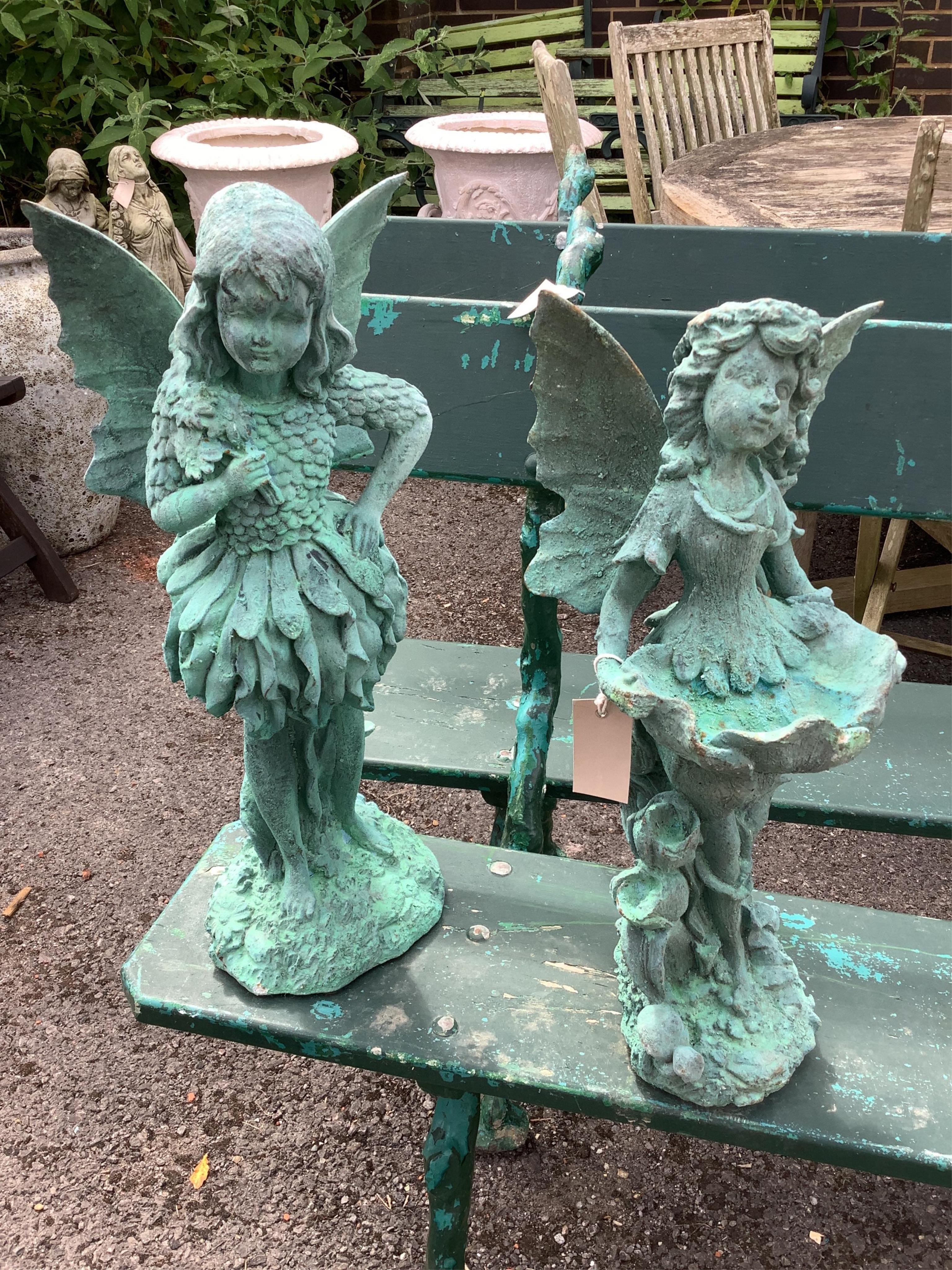 Two cast iron fairy garden ornaments, larger height 54cm. Condition - good